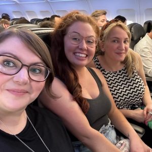 Emma, Rebecca and Caitlin on the plane to NYC